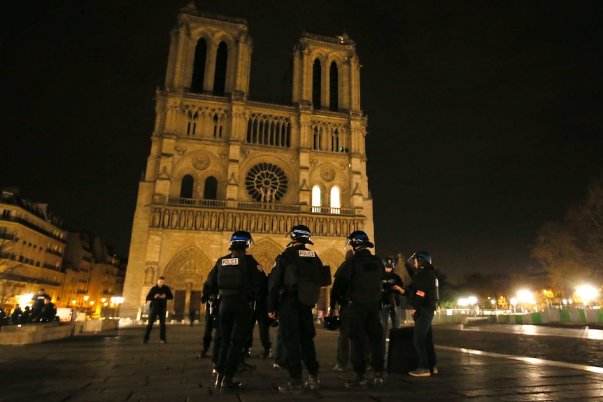Police patrol near Notre Dame Cathedral