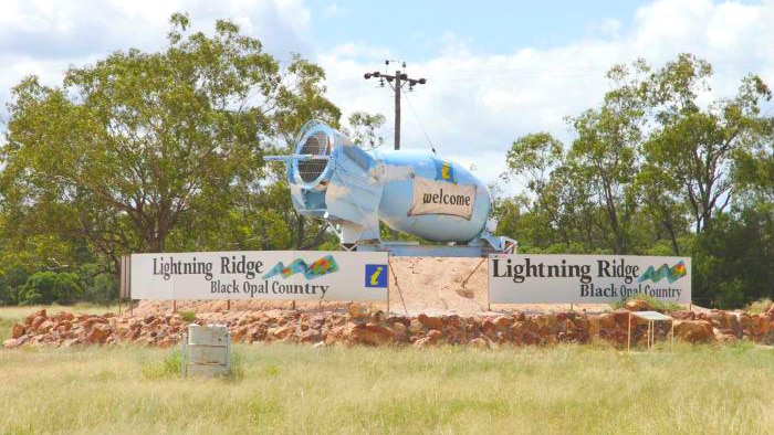 Sign welcoming visitors to Lightning Ridge