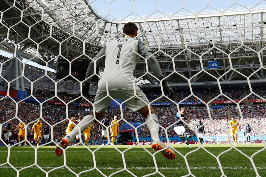 Socceroos goalkeeper Mat Ryan faces France's Antoine Griezmann from 12 yards at the 2018 World Cup