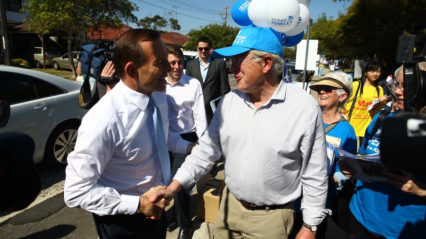 Opposition Leader Tony Abbott greets voters in the Sydney electorate of Kingsford Smith.