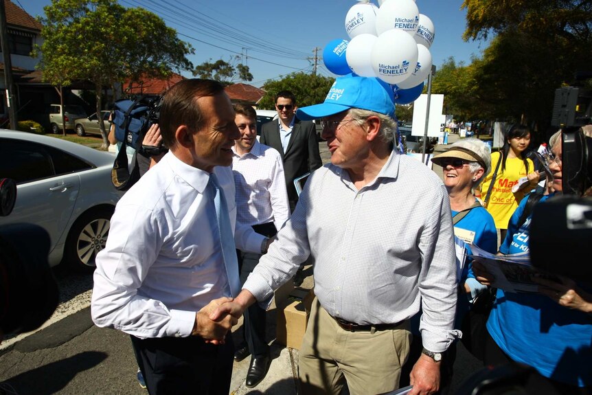 Opposition Leader Tony Abbott greets voters in the Sydney electorate of Kingsford Smith.