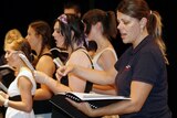 Moving Opera's Dania Cornelius in foreground, training students at a Brisbane workshop.