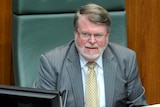 Speaker of the House Harry Jenkins listens to Prime Minister Julia Gillard during question time.