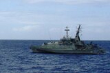 The boat was intercepted by HMAS Wollongong after being spotted by a border protection plane