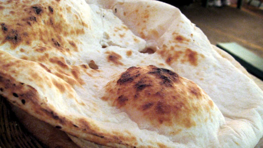 Naan bread in a basket.