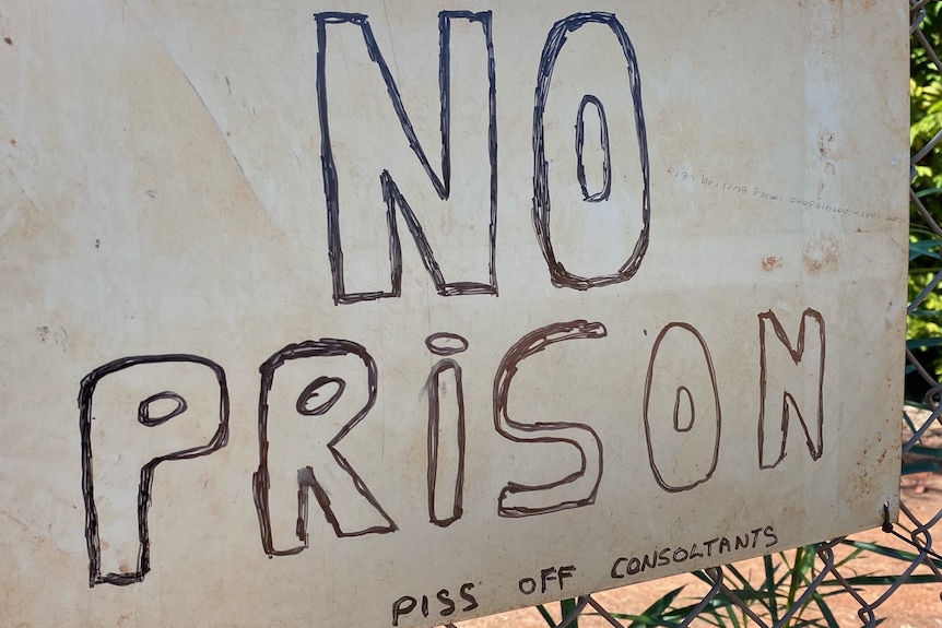 A poster protesting against a proposed prison at 12 Mile community outside Broome.