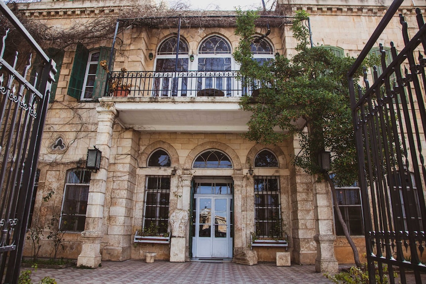 An outside view of the Palmyra Hotel.