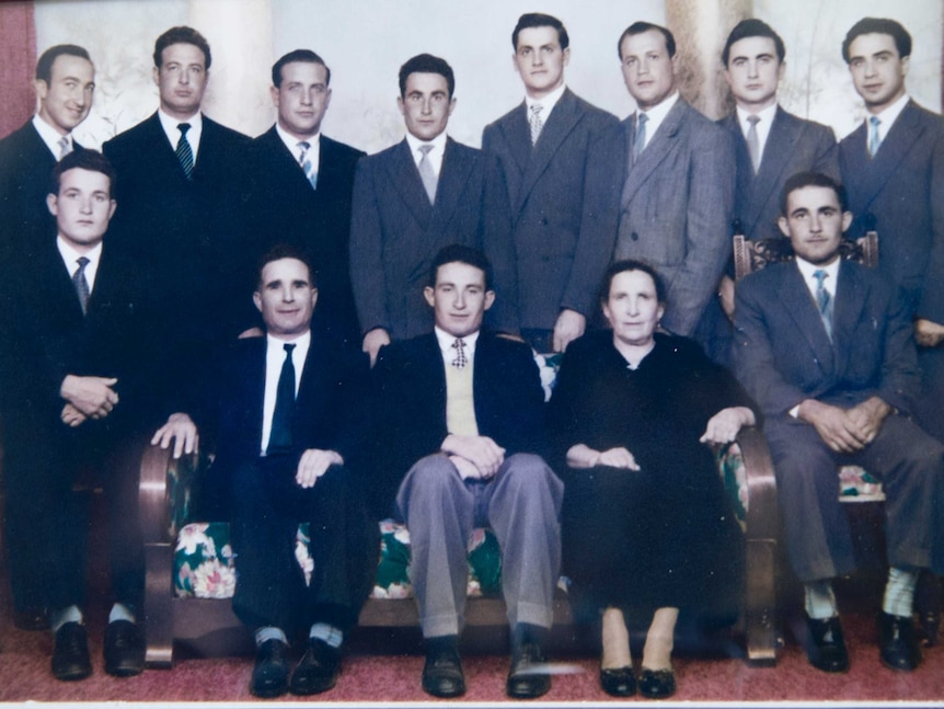 Rita and Tony Faranda's family portrait at the entrance to their home