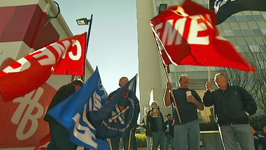 Members of the CFMEU protest in Hobart