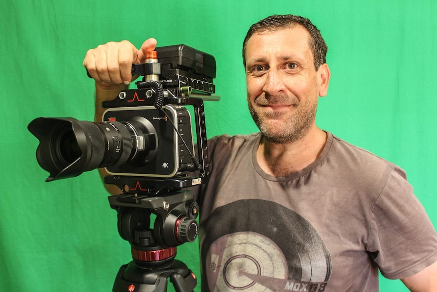 Peter Renzullo behind his camera