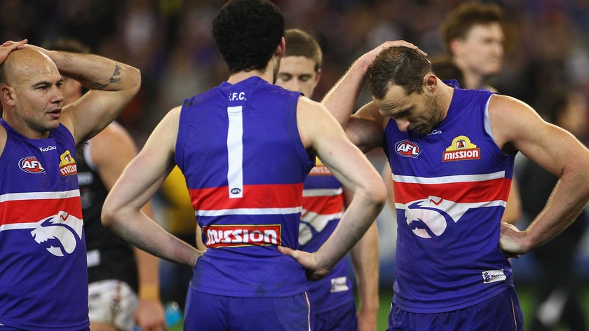 Dogs gone ... Rodney Eade's men led at the first two breaks but couldn't hold off the surging Saints.