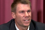 David Warner cries while giving a press conference.