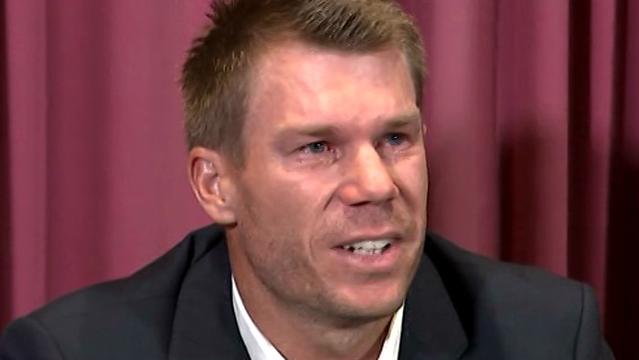 David Warner cries while giving a press conference.