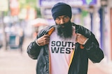Sydney hip-hop artist Sukhdeep Singh Bhogal AKA L-Fresh the Lion wearing a t-shirt saying "South West"