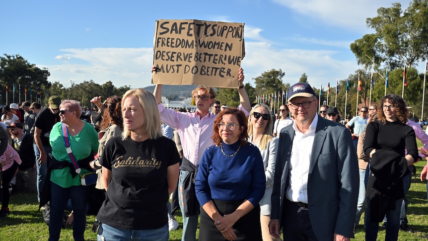 Cabinet ministers Katy Gallagher, Amanda Rishworth and Prime Minister Anthony Albanese at an anti-violence rally in Canberra.