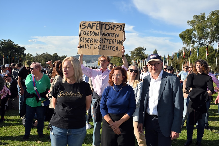 Cabinet ministers Katy Gallagher, Amanda Rishworth and Prime Minister Anthony Albanese at an anti-violence rally in Canberra.