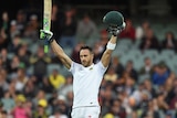 Faf du Plessis reacts after scoring a century on day 1 of the third test match in Adelaide, November 24, 2016.