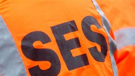 An orange jacket with the letters SES