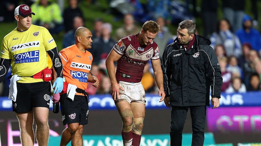 Daly Cherry-Evans leaves the field injured against the Bulldogs