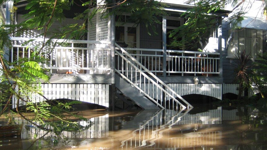 Waters inundate the bottom storey of this home in Auchenflower.