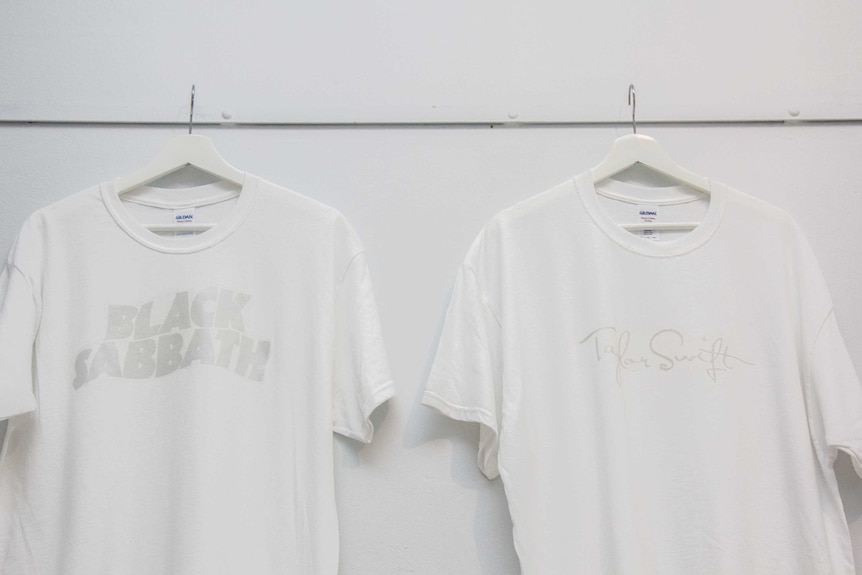 Ghostly reproductions of band T-shirts at Ghost of a record store