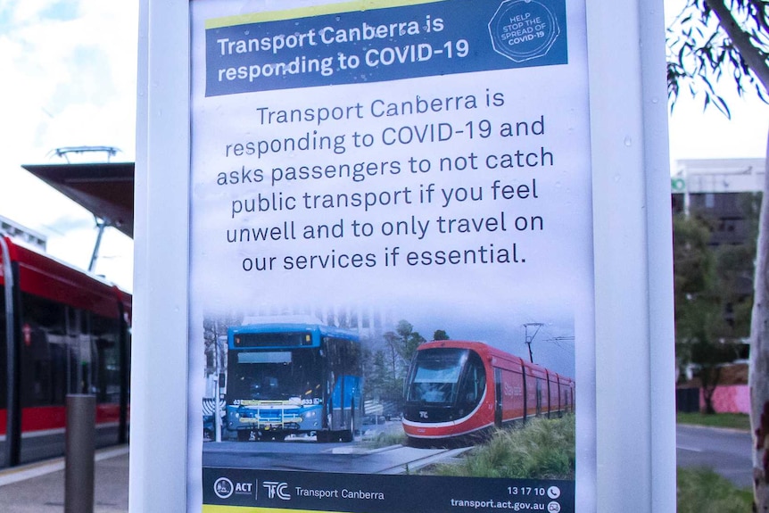 A sign at a light rail station recommending unwell patrons do not catch ACT public transport.JPG