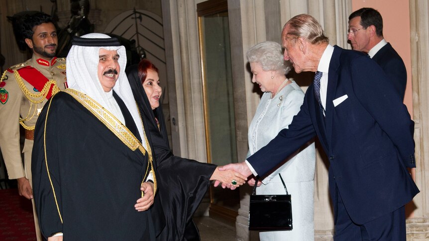 Queen Elizabeth II and Prince Philip greet Bahrain's King Hamad bin Issa al Khalifa (2nd L) at Windsor Castle.