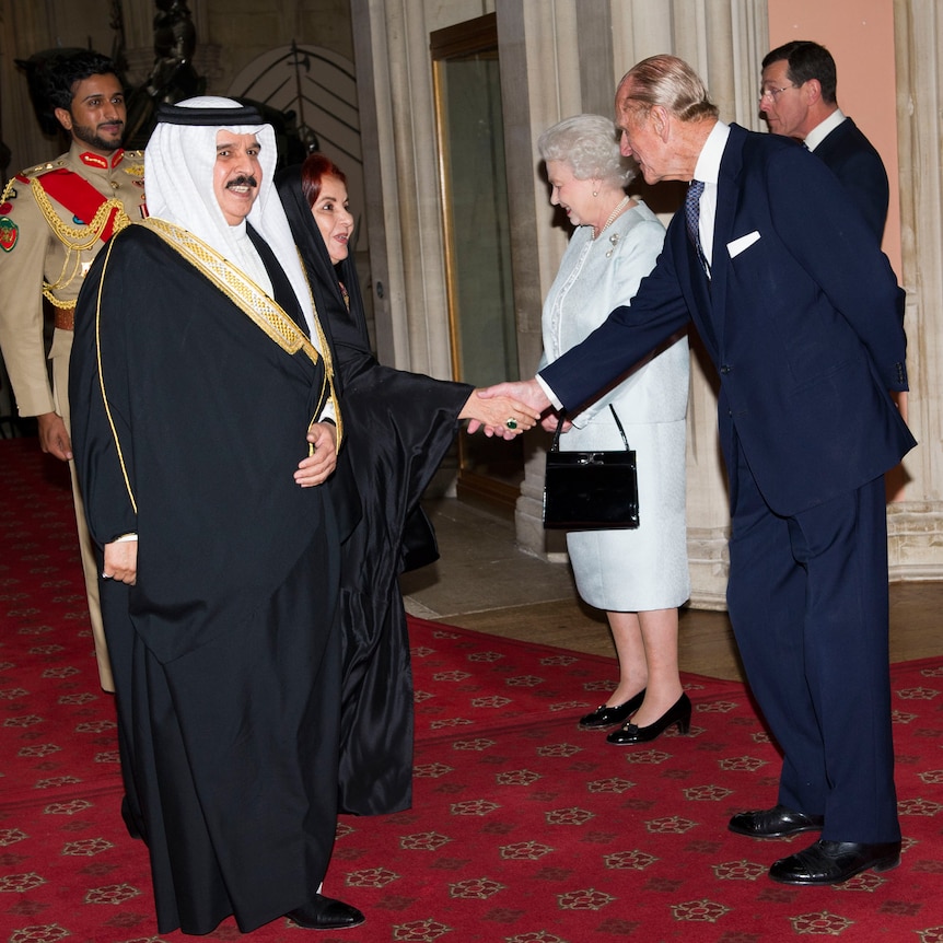 Queen Elizabeth II and Prince Philip greet Bahrain's King Hamad bin Issa al Khalifa (2nd L) at Windsor Castle.