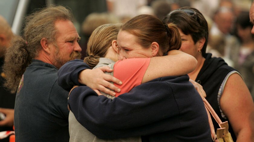 Marysville residents greet each other at the Alexandra evacuee center.