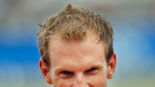 Australian kayaker Ken Wallace gets a taste of his gold medal