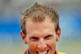 Australian kayaker Ken Wallace gets a taste of his gold medal