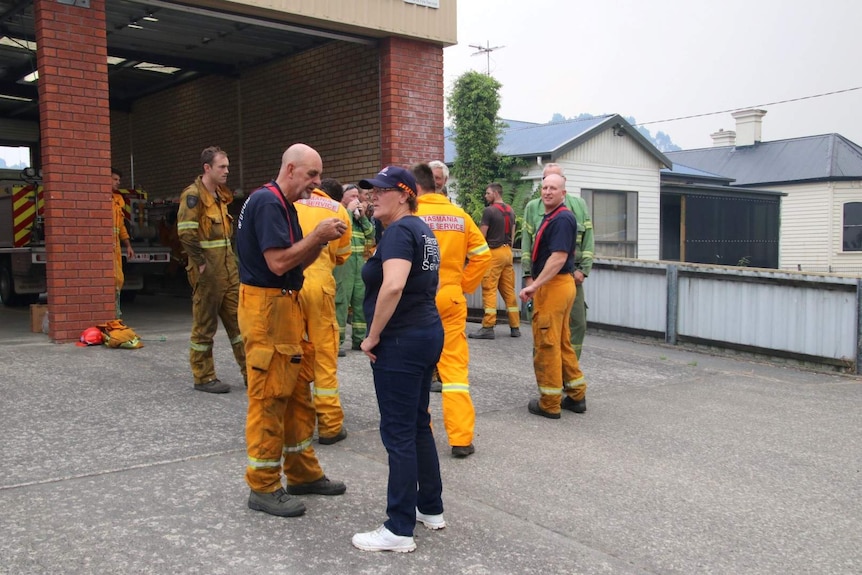 Firefighters outside the fire station in Zeehan.