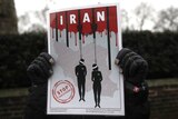 Poster with illustration of people being hung reads 'Iran' and 'stop executions'
