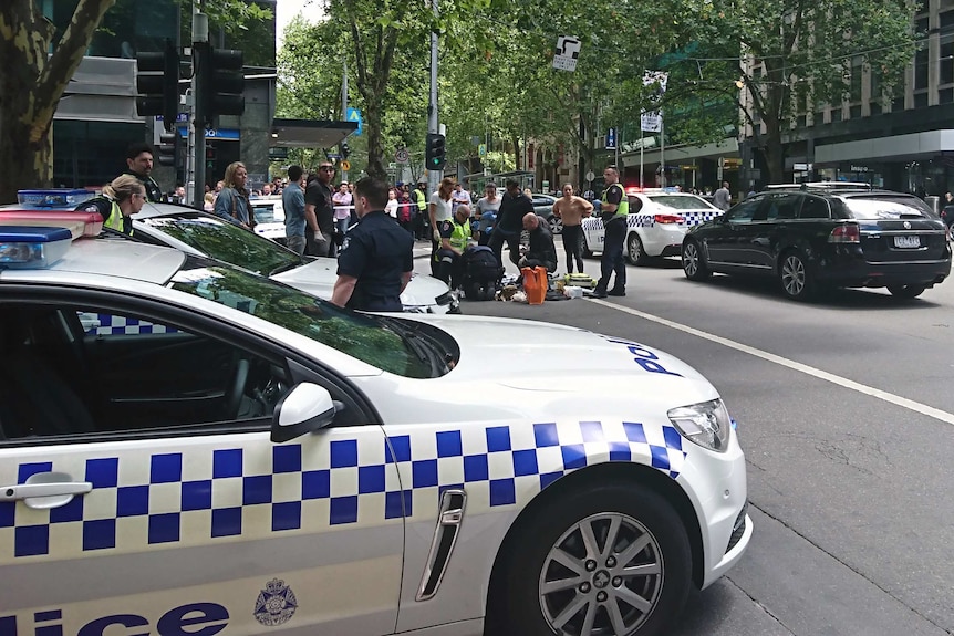 Police arrive after a car hits pedestrians in the Melbourne CBD