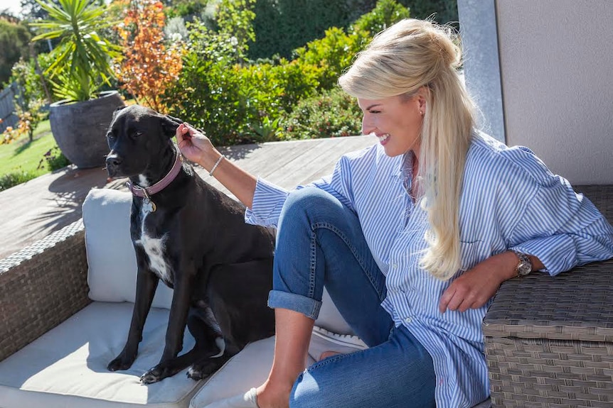 Registered nurse Sharee Rayner with her pet dog