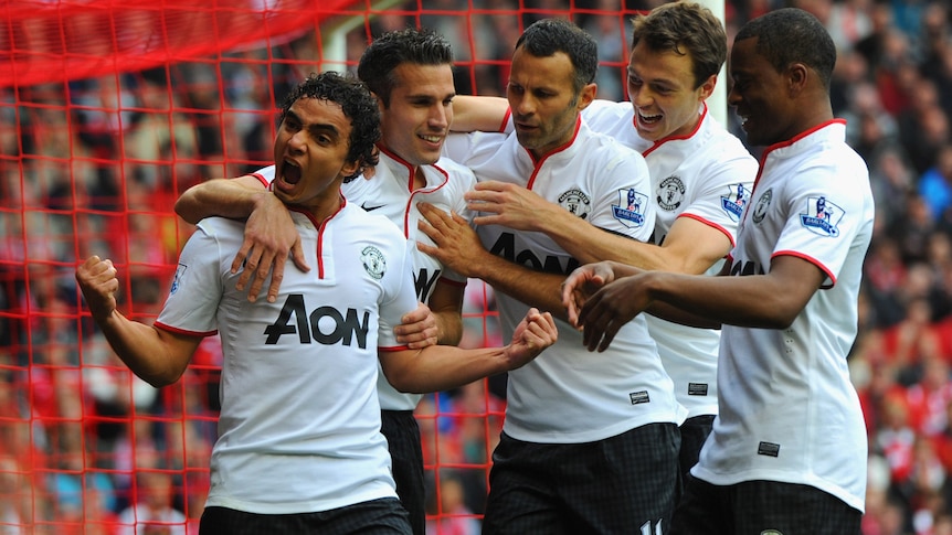 Rafael celebrates his goal at Anfield