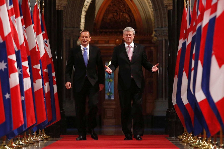 LtoR Prime Minister Tony Abbott and Canada's Prime Minister Stephen Harper