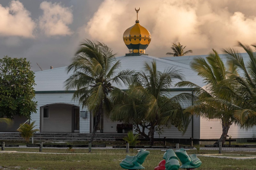 Home Island mosque is at the centre of the kampong.