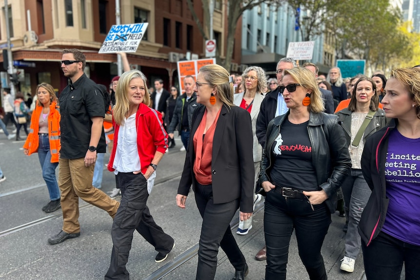 Women marching through the Melbourne CBD
