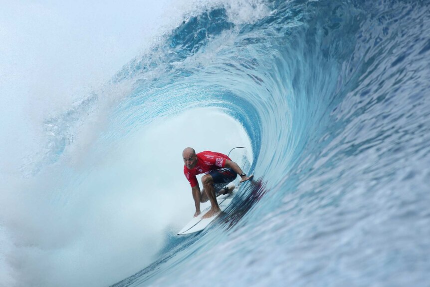 Kelly Slater on his way to a win in Tahiti, the 55th of his professional career.
