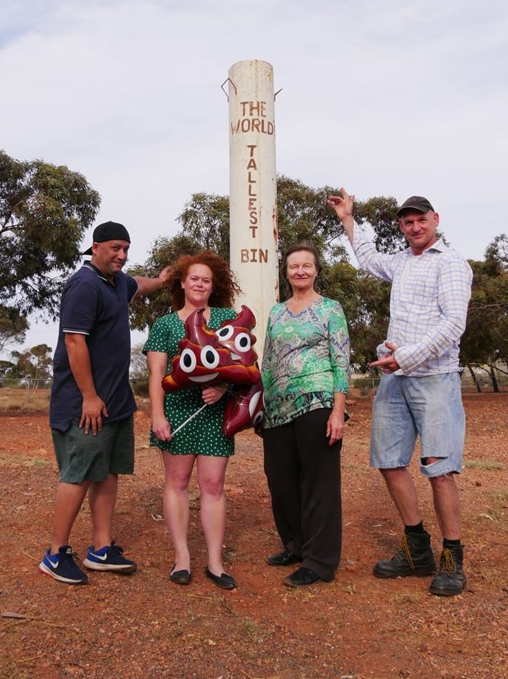 Sarah Hinton stands at Kalgoorlie's World's Tallest Bin.