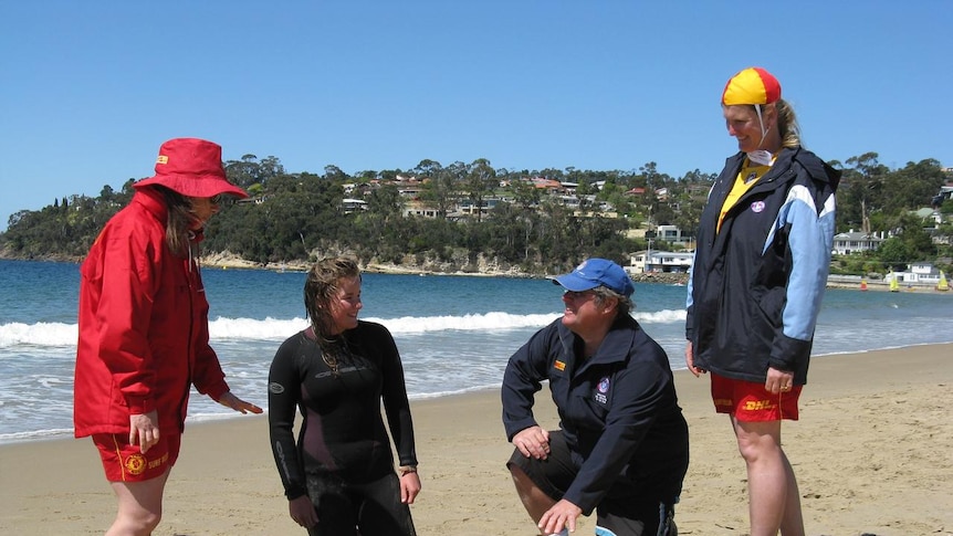 Surf Lifesaving Tasmania training new volunteers on a Hobart beach.