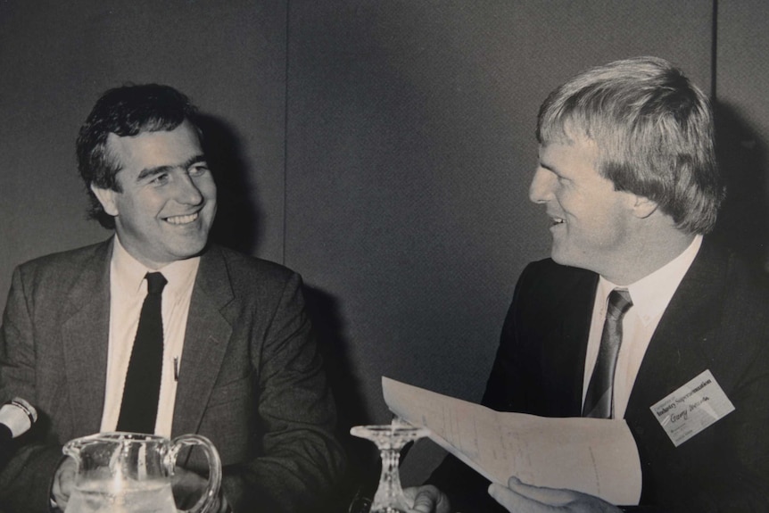 A black and white photo of Alan Kohler with Garry Weaven