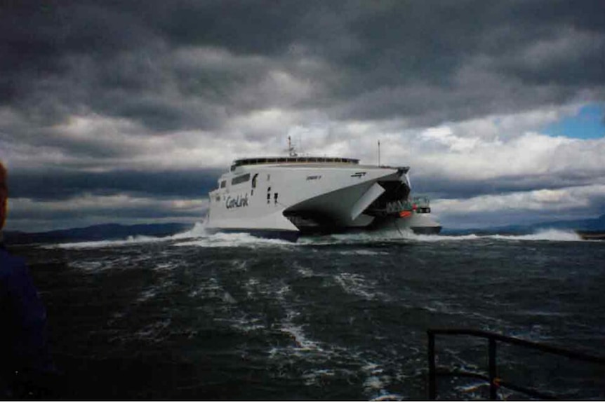 The Incat catamaran ferry Condor II grounded on Black Jack Rocks.