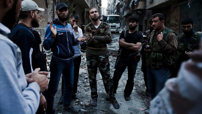Free Syrian Army fighters from various brigades in Aleppo
