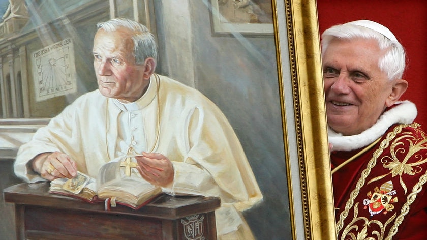 Pope John Paul II (in portrait) died in April 2005.