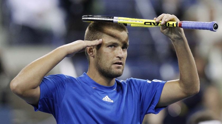 Youzhny salutes the crowd