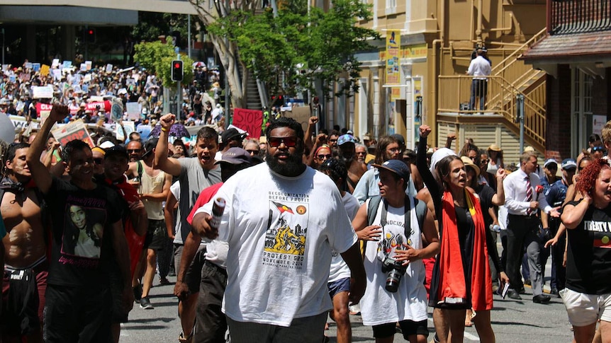 Aboriginal activists and other anti G20 protesters march from Roma Street in the Brisbane CBD.