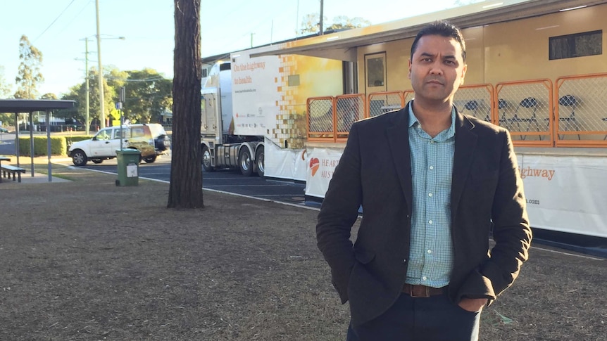Dr Rolf Gomes outside his mobile cardiac clinic in Dalby