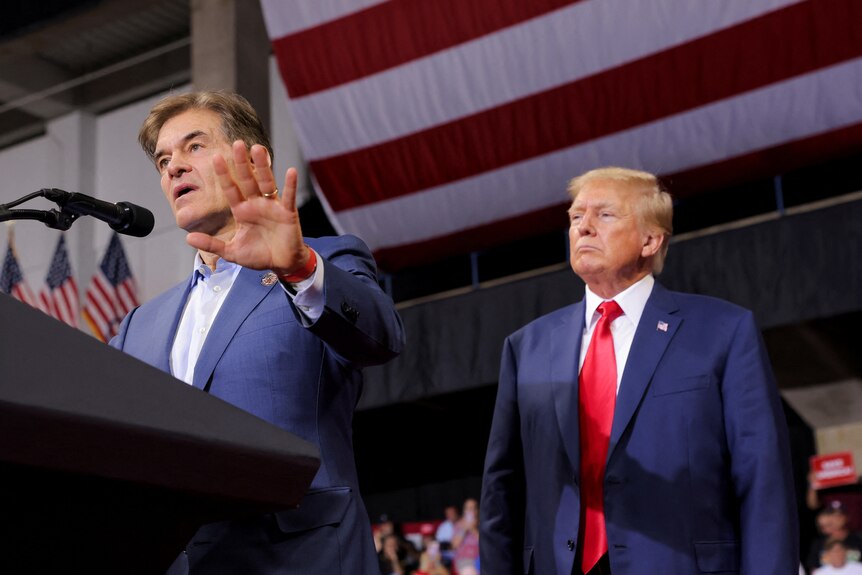 Republican candidate Dr Mehmet Oz with former US President Donald Trump